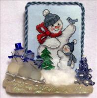 Snowman With Bird
